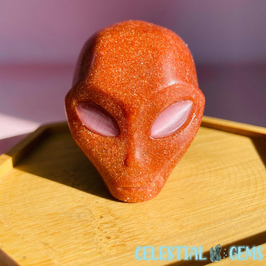 Golden Sandstone Alien With Pink Cats Eye Eyes Carving