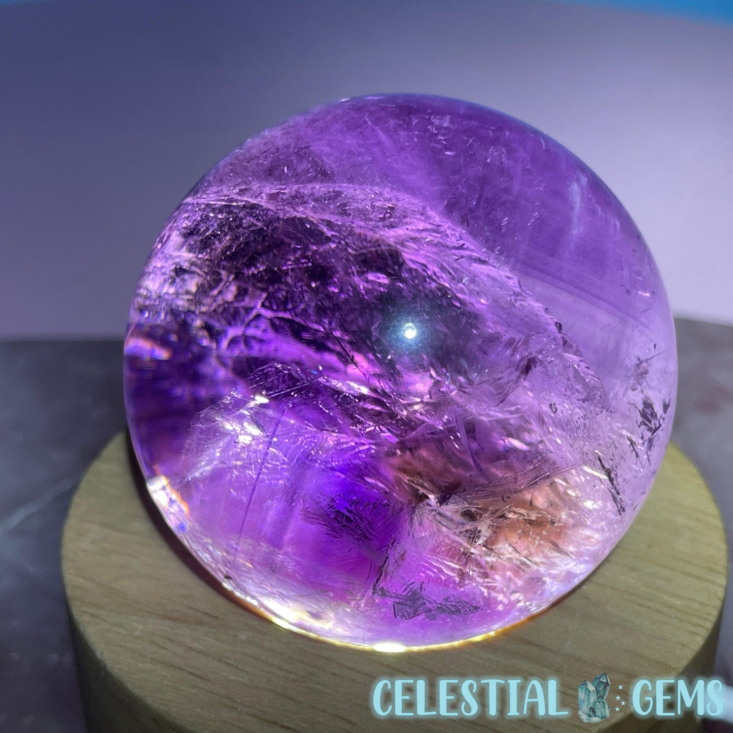 A Grade Bolivian Phantom Ametrine Medium Sphere (Video)
