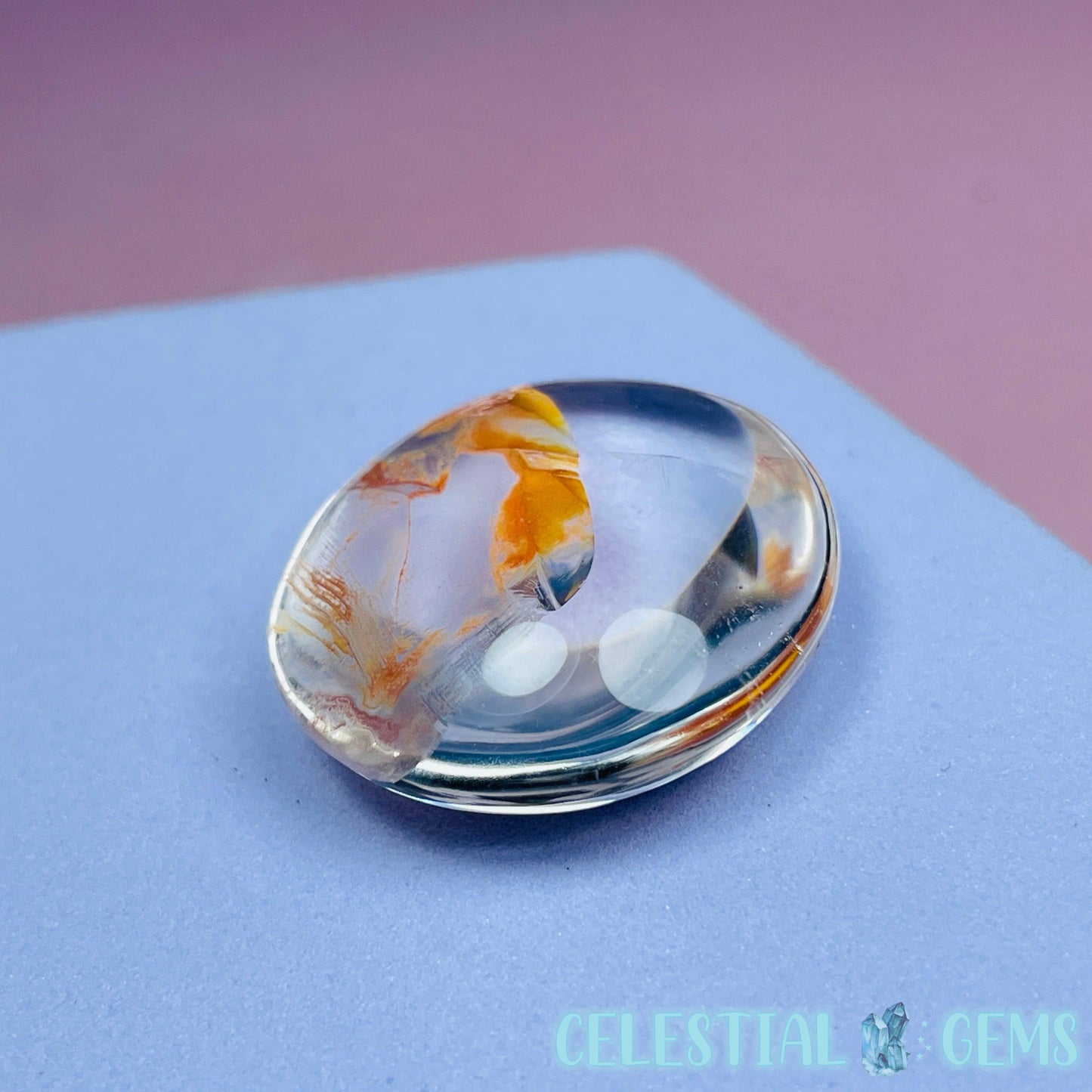 Iron 'Koi Fish' Clear Quartz Round Stone