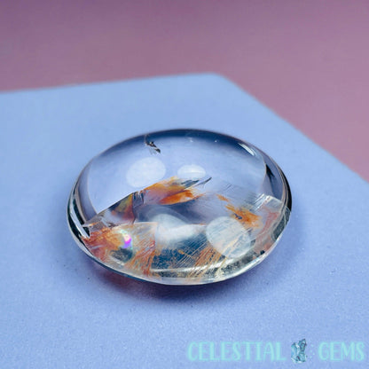 Iron 'Koi Fish' Clear Quartz Round Stone