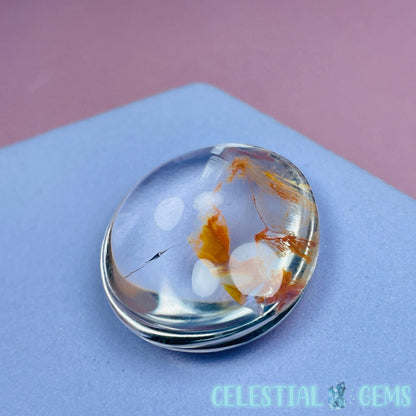 Iron 'Koi Fish' Clear Quartz Round Stone