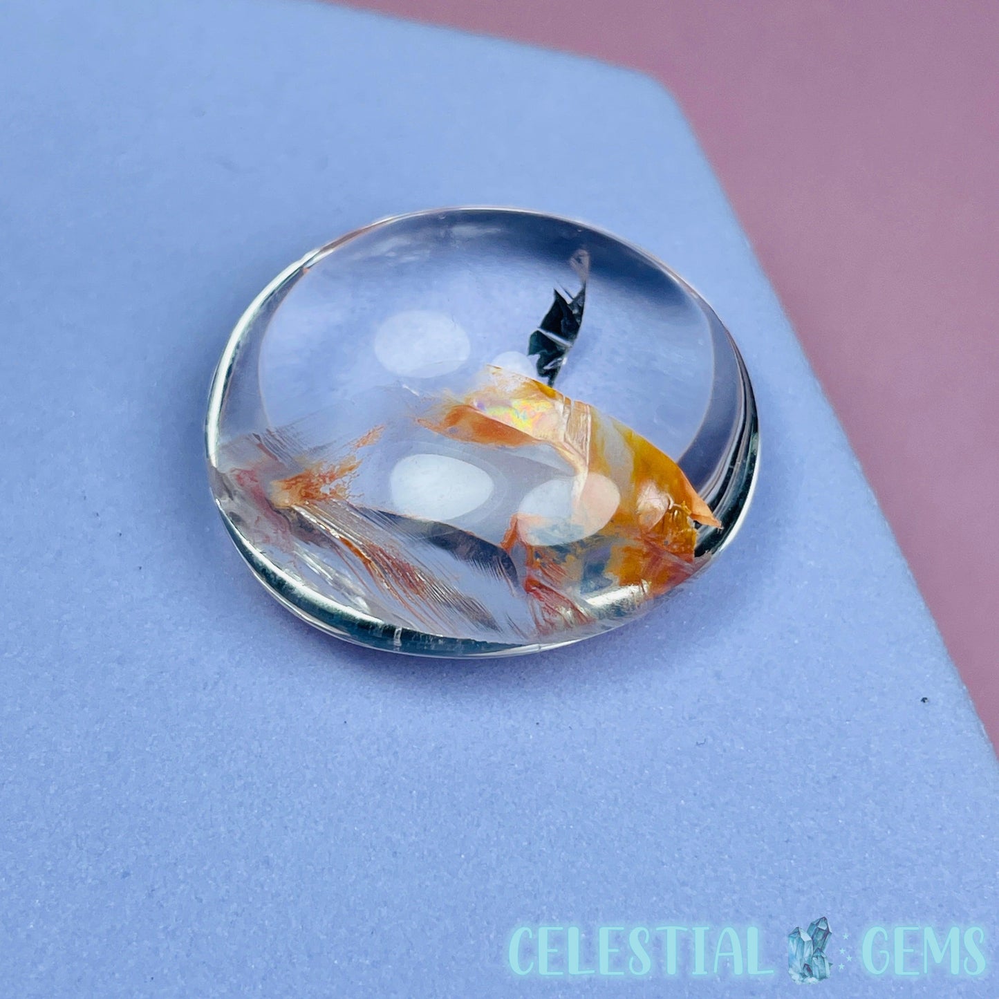 Iron 'Koi Fish' Clear Quartz Round Stone