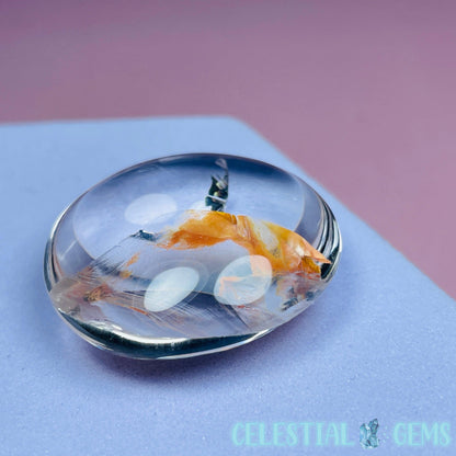 Iron 'Koi Fish' Clear Quartz Round Stone