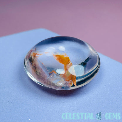 Iron 'Koi Fish' Clear Quartz Round Stone