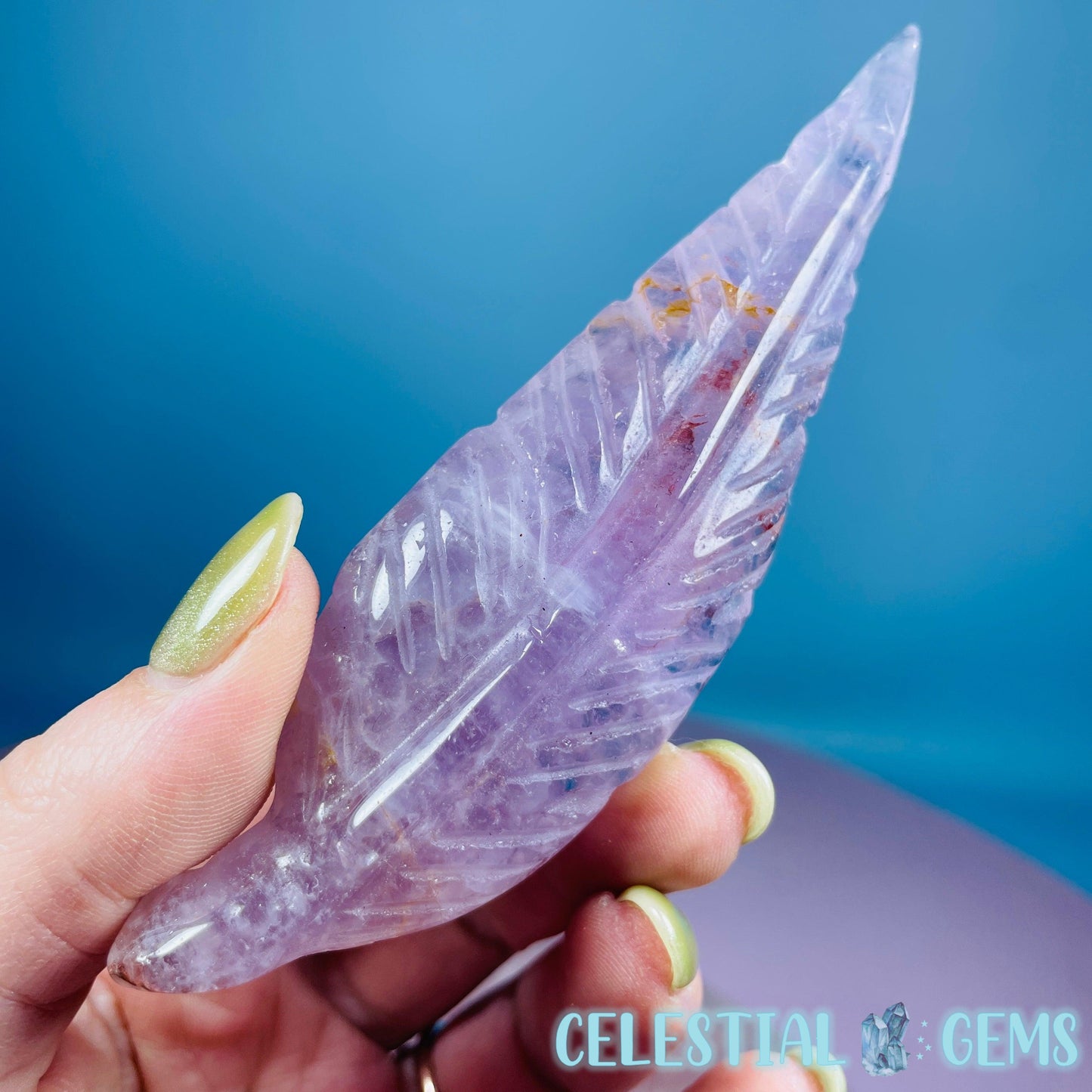 Amethyst with Hematite Feather Carving