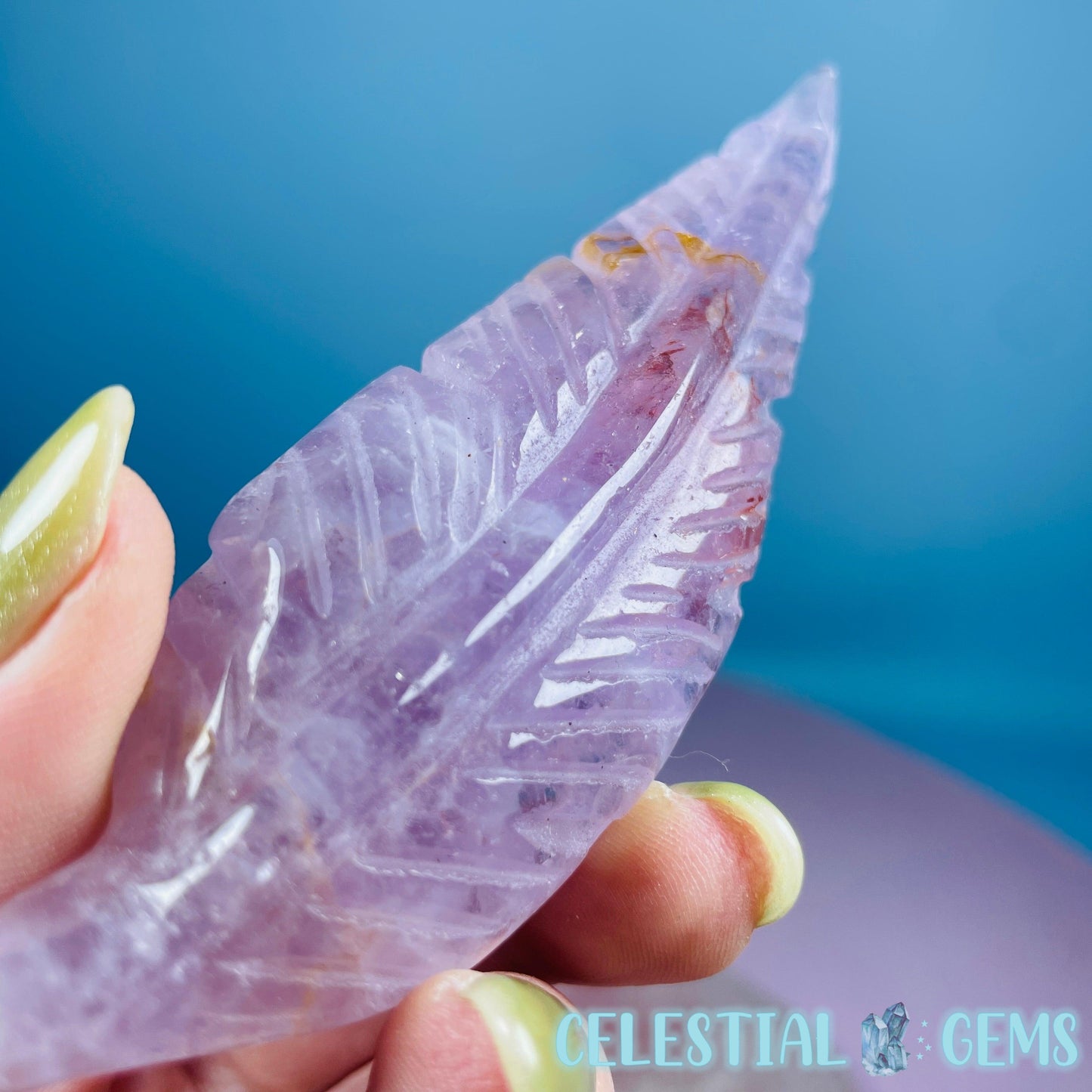 Amethyst with Hematite Feather Carving