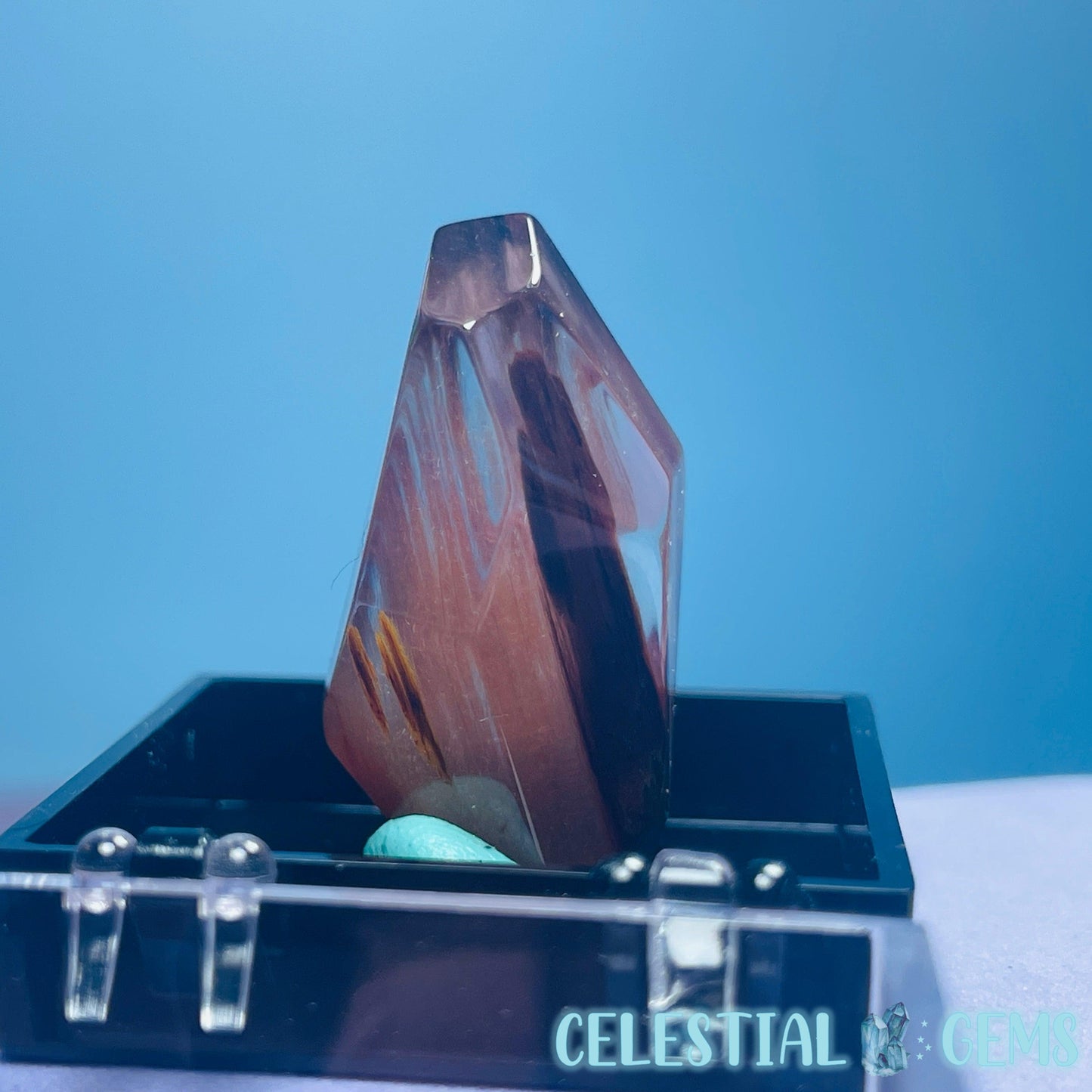 Red Amphibole Quartz Faceted Gemstone in Specimen Box