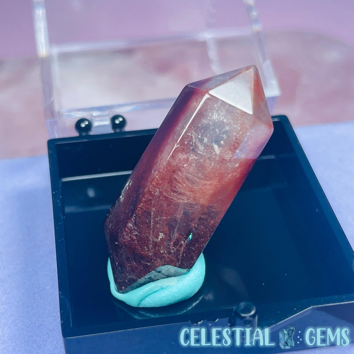 Red Amphibole Quartz Faceted Gemstone in Specimen Box