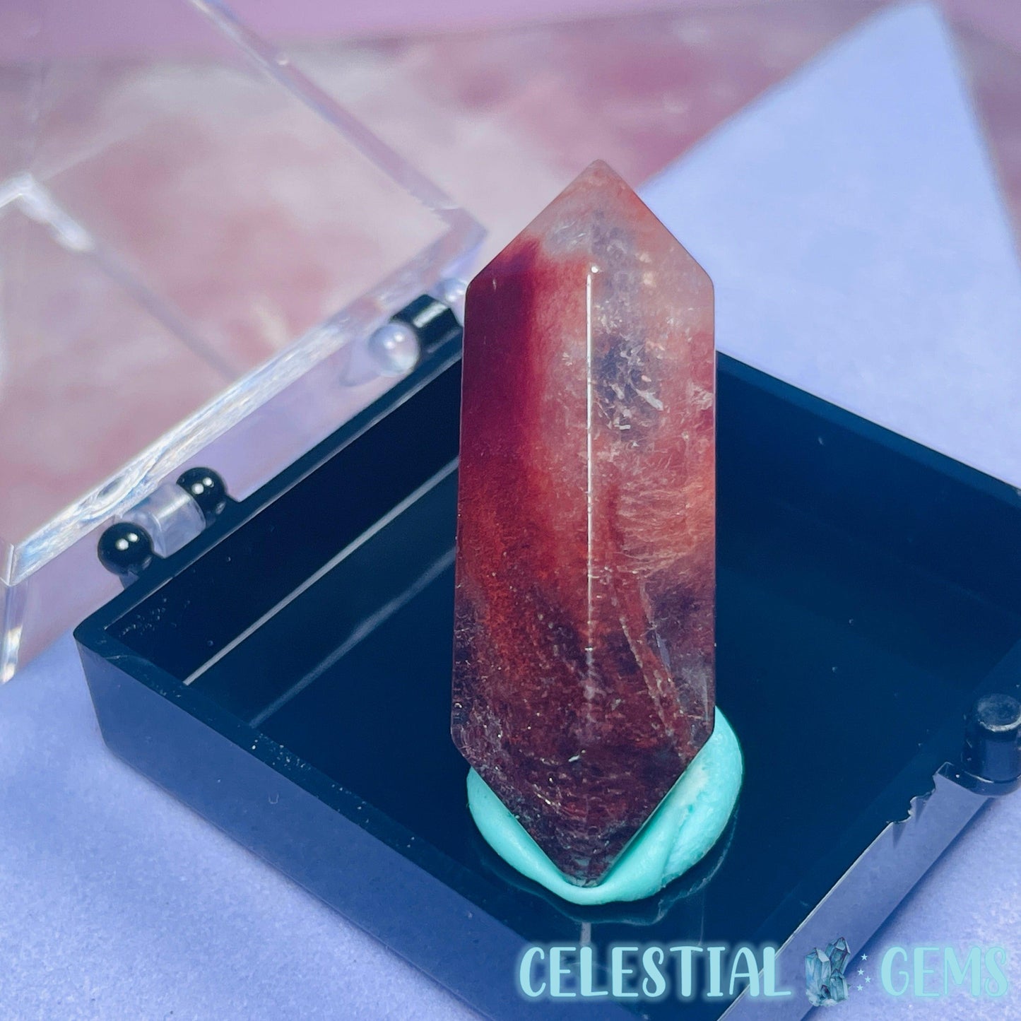 Red Amphibole Quartz Faceted Gemstone in Specimen Box