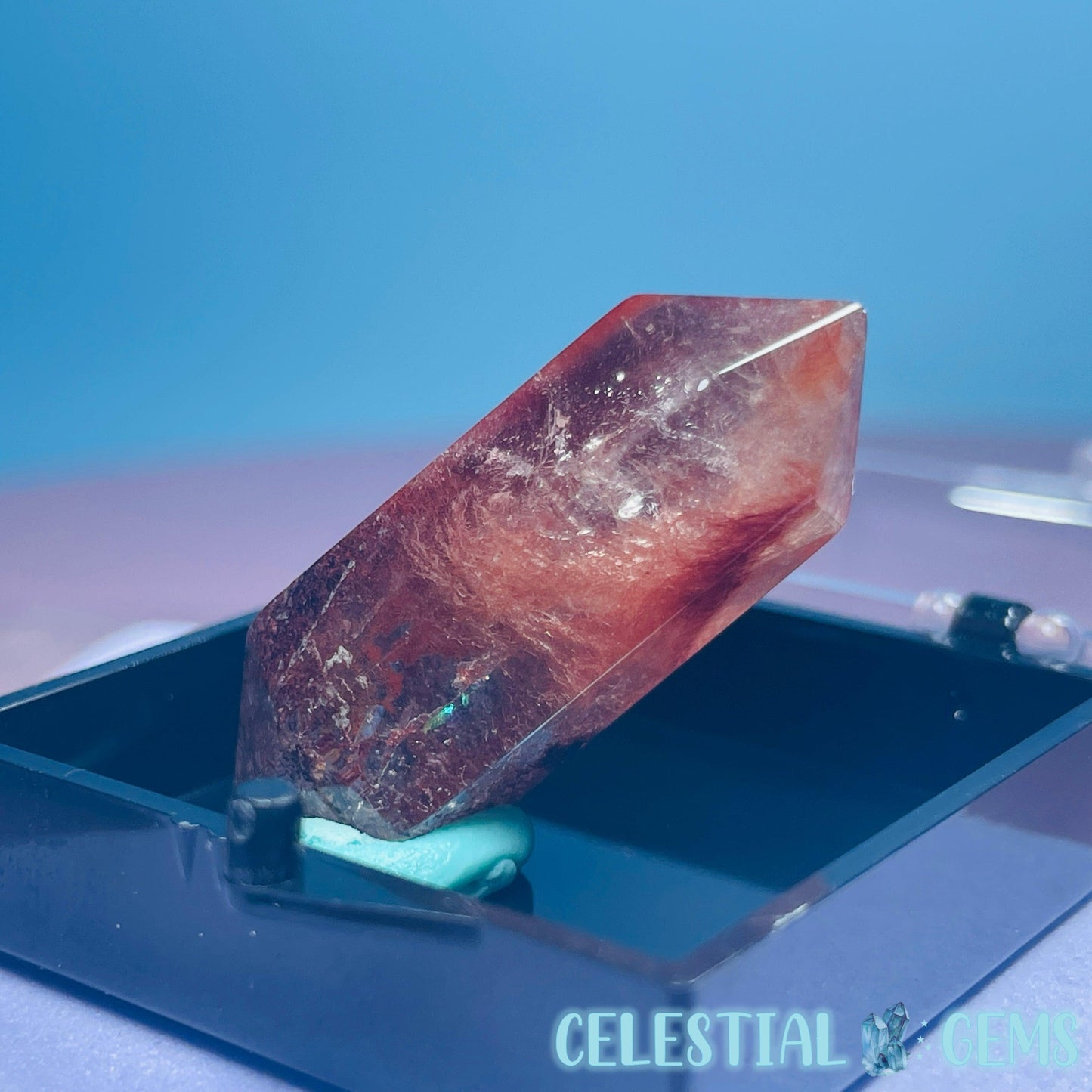 Red Amphibole Quartz Faceted Gemstone in Specimen Box