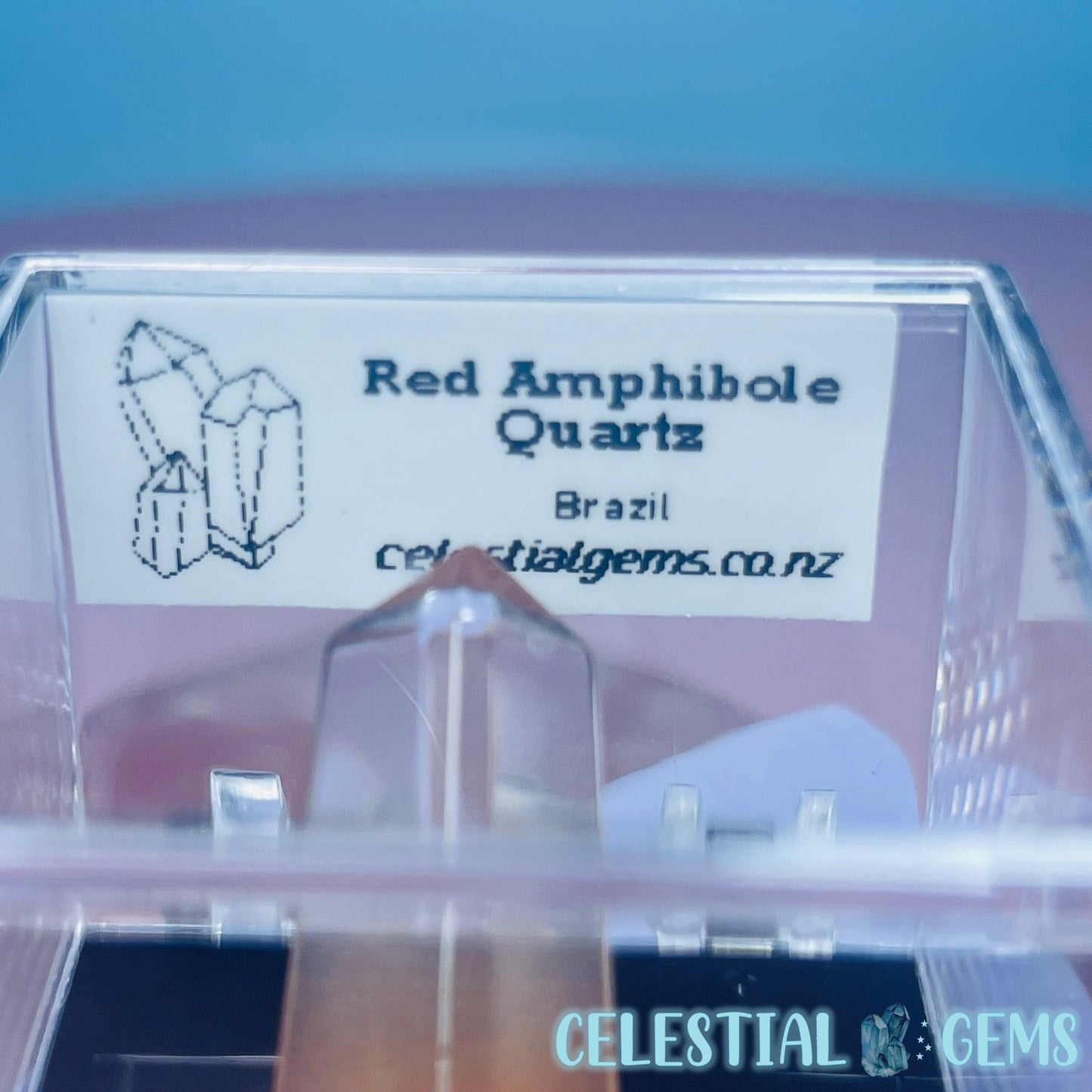 Red Amphibole Quartz Faceted Gemstone in Specimen Box