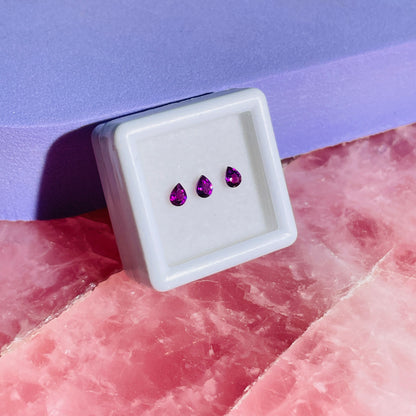 Rhodolite Garnet Set of 3 Faceted Pear-Cut Gemstones in Specimen Box