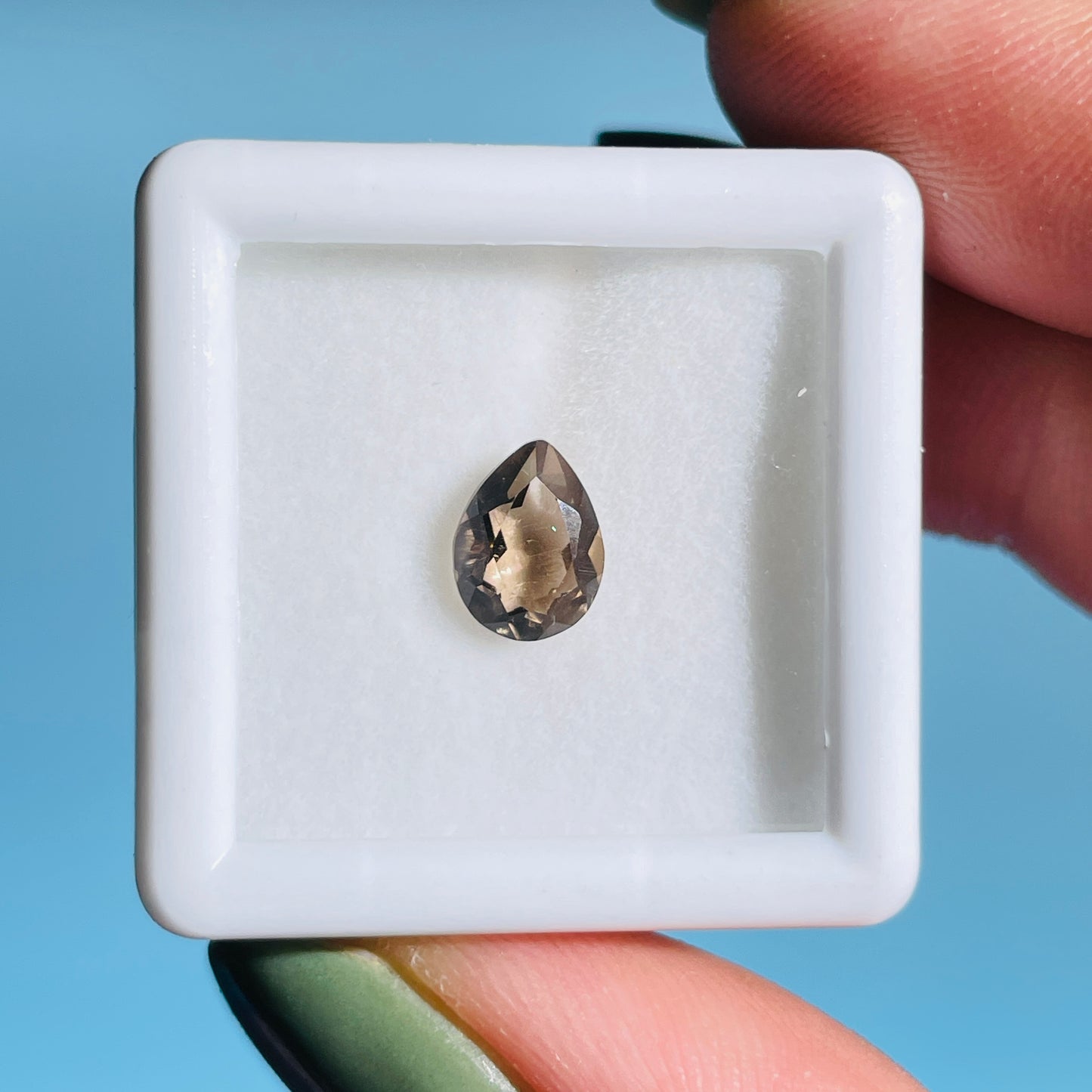 Smoky Quartz Faceted Oval-Cut Gemstone in Specimen Box