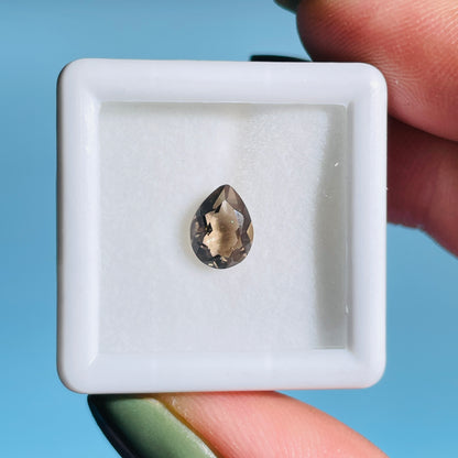 Smoky Quartz Faceted Oval-Cut Gemstone in Specimen Box