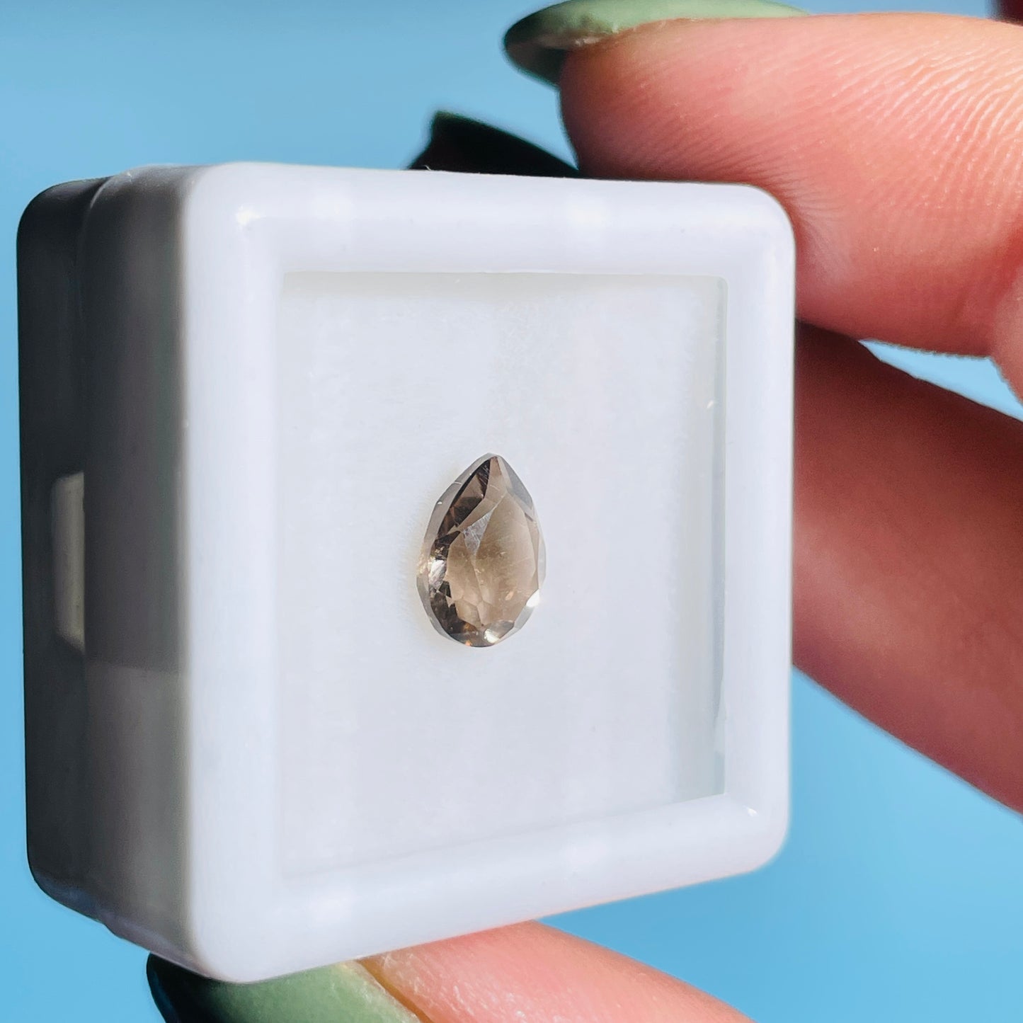 Smoky Quartz Faceted Oval-Cut Gemstone in Specimen Box