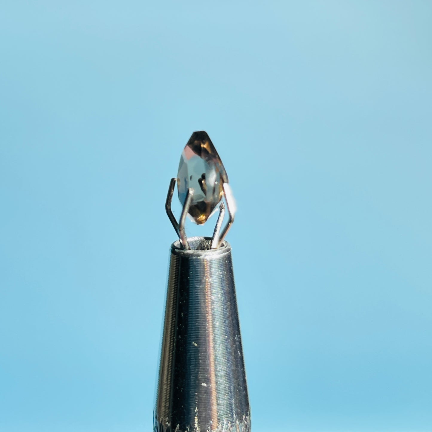 Smoky Quartz Faceted Oval-Cut Gemstone in Specimen Box